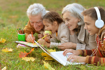 grandparents spending time with grandchildren 