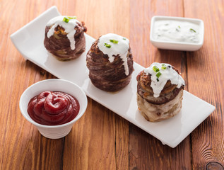 potato wrapped in bacon baked