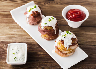 potato wrapped in bacon baked