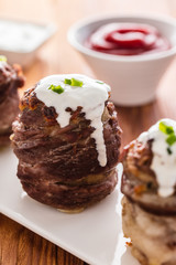 potato wrapped in bacon baked