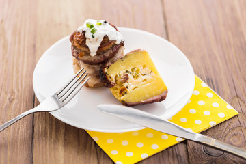 Baked potatoes with cheese and bacon