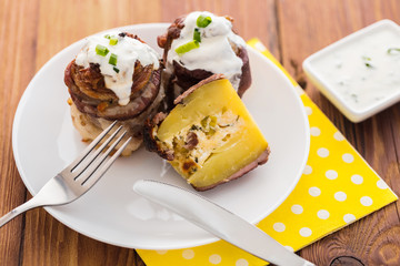 Baked potatoes with cheese and bacon