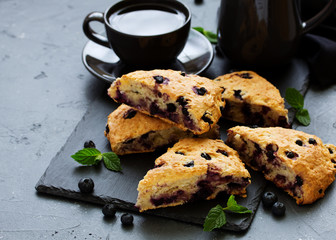scones with oatmeal, blueberries and coconut. - obrazy, fototapety, plakaty