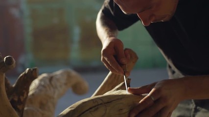 Close up man carve wood beautiful rapid slow motion