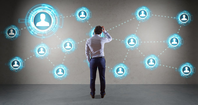 Businessman using social network interface on a wall 3D rendering