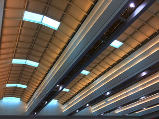 Roof Structure with Reflected Lights Viewed Inside the Building