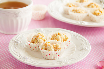 Homemade dietary sweets with dried fruits in white chocolate.