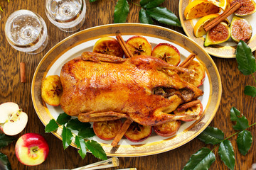 Festive Christmas duck baked with apples and figs.