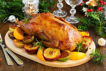 Festive Christmas duck baked with apples and figs.