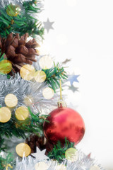 Fototapeta premium Christmas red giftbox ornametn ball decorate on pine tree copy space blur background for Xmas New Year festival.