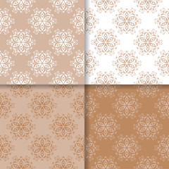 Set of floral colored seamless patterns. Brown white backgrounds