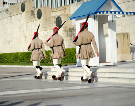 Soldier guard walking traditional greek uniforms