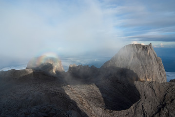 Sunrise and rainbow over the Mount Kinabalu in Malaysia