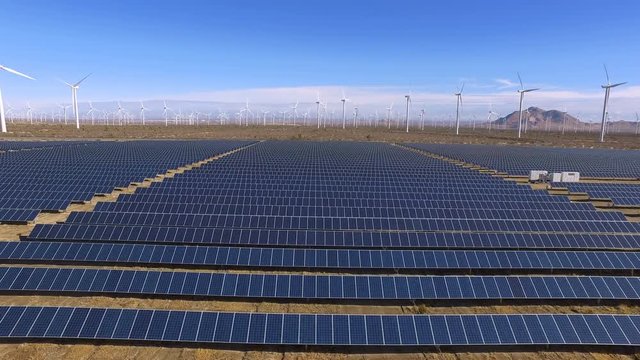 Solar array and wind farm, alternative energy, aerial footage