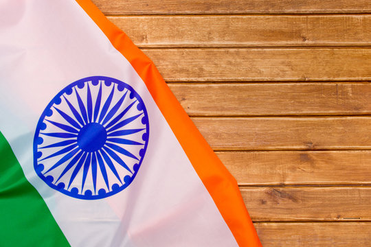 The Flag Of The Republic Of India on wooden background. The place to advertise, template.View top.