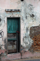 Wood Door in a Brick Wall