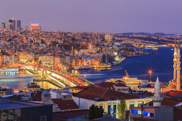 Istanbul view from down town of the city during the twilight with beatiful atmospheric blue sky and city lights