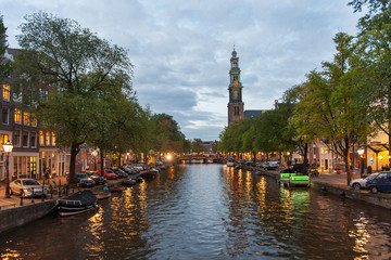 A canal and the Westerkerk church in Amsterdam, Netherlands