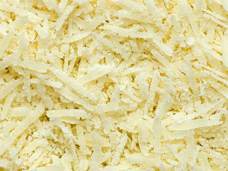 finely grated parmagiano reggiano cheese food background