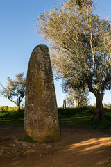 Megalithic monument. The Almendres Menhir is single standing stone near Evora in Portugal dating from 5000-4000 BC. Standing about 4 meters high.