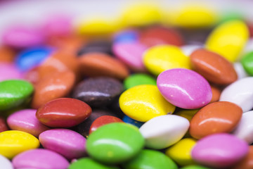 Fototapeta na wymiar Background of colorful candy drops.