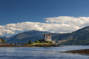 Fototapeta na wymiar View of the Eilean Donan Castle in the Highlands of Scotland, United Kingdom; Concept for travel in Scotland