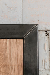 Iron stand for glasses on a wooden base in the loft style