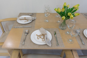 table set on wooden dining table