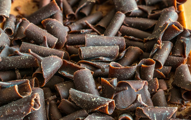 Sweet tasty dessert, chocolate mousse with chocolate flakes closeup