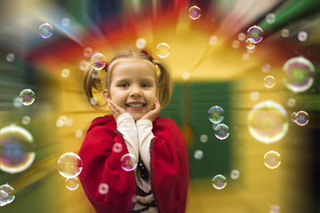 Cute blonde little girl wearing Red Riding Hood costume