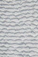 white knitted pattern, detail, closeup.  Santorini Greece.