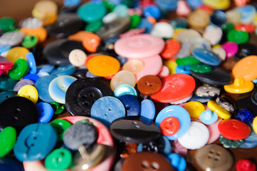 Sewing buttons background. Colorful sewing buttons texture