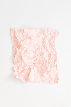 Pink crumpled paper texture