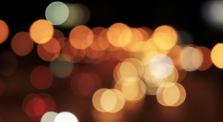 bokeh is a multicolored band. Car lights of traffic at night  reflection is sparkling beautiful. For as background