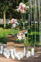 Wedding decor - flowers, crystal arch, candles