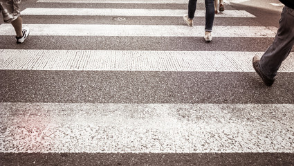 People crossing the road in town