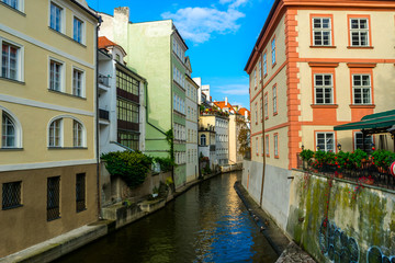 Fototapeta na wymiar Prague in Venice in the Czech Republic. Narrow channels and brightly painted houses right on the canal side