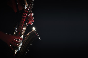 Obraz premium Saxophone Player Saxophonist hands playing jazz