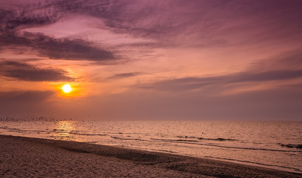 Sunset over the sea beach