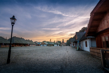 Sunset on old main market. Open-air museum, Sanok, Poland.