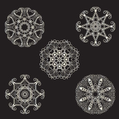 Collection of silver mandalas of 5 elements, design elements on a black background
