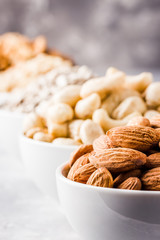 Nuts and seeds mix-sunflower seeds, pine nuts, cashew, walnut, almond. Selective focus,space for text. 