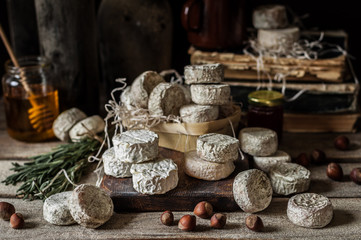 Variety of French Cheeses in a Dusty Pantry