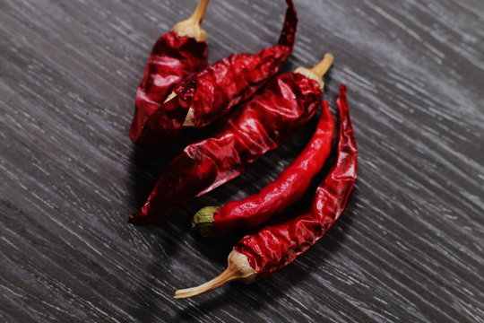 red pepper and chili on wood table mexican 