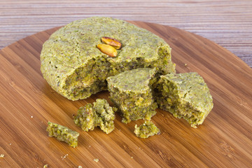Cookie with Pistachio on Wooden Background
