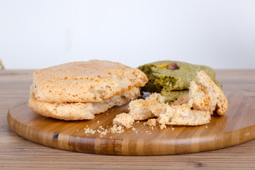 Cookie with Pistachio on Wooden Background