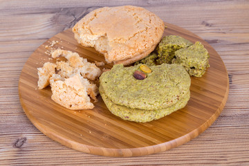 Cookie with Pistachio on Wooden Background