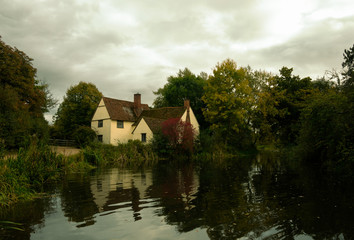 Obraz premium Dark Autumn Day English Country Mill Cottage House