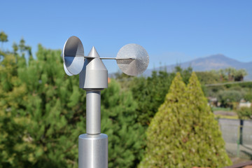 close up of aluminum anemometer on roof
