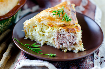 Pie with meat and cheese